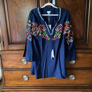 New with tag tassel still in the wrapper. Great BoHo dress.